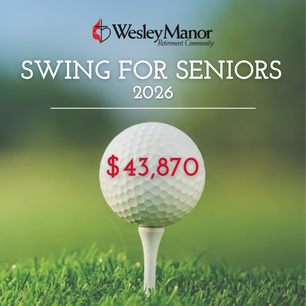 WM Golf Sponsors 2026 A golf ball on a tee and “$43,870” in red text highlight the Wesley Manor Swing for Seniors event, with “Wesley Manor Retirement Community,” “Swing for Seniors,” and “2026” above a blurred green golf course background.